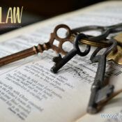 Close-up of vintage keys resting on an open book, with the JZW Law Professional Corporation logo in the top-left and the site address www.jzwlaw.ca visible at the bottom.